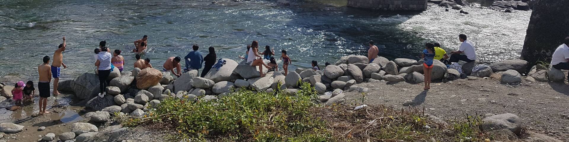 Locals taking a break from the climate. Rio Verde, Ecuador