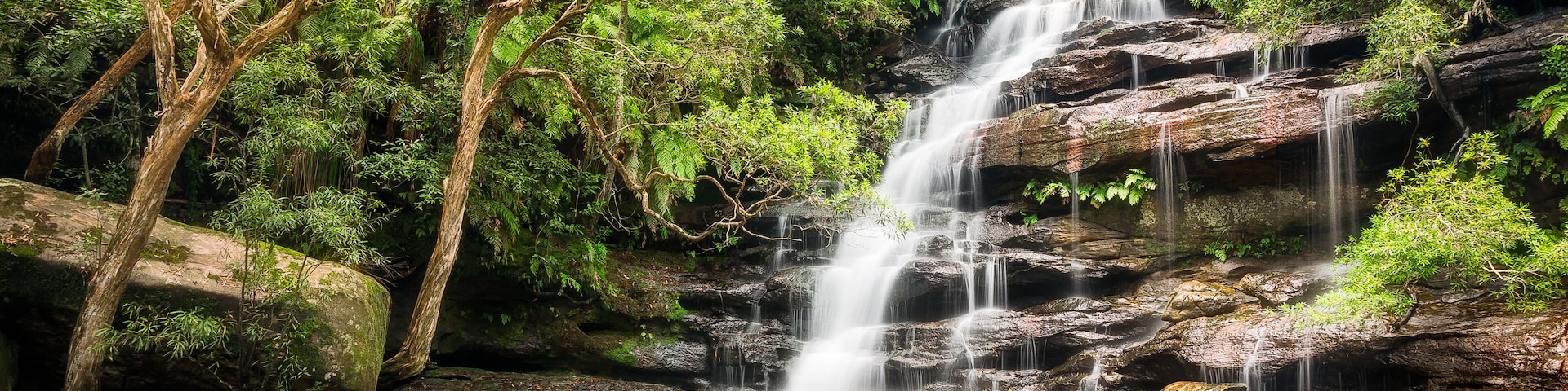 Somersby Falls is a beautiful waterfall located only one hour drive North of Sydney, along Floods Creek in Brisbane Water National Park, NSW, Australia., Shutterstock ID 614410094, Purchase Order: -