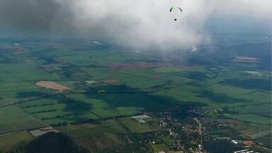 A view from up near the clouds paragliding in Columbia. This was an air to air shot taken with iphone7+