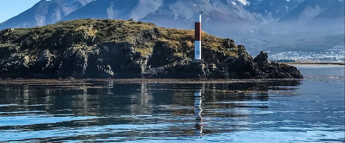 The oppositely colored lighthouse earlier used by ships to cross Beagle Channel. #Ushuaia #tierradelfuegoarchipelago