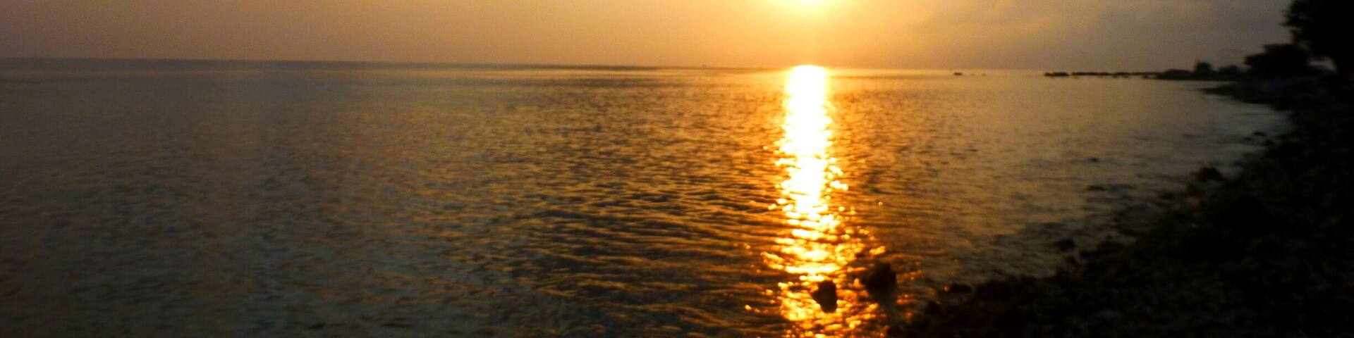 Beautiful sunrise off the shore. Peaceful and serene.