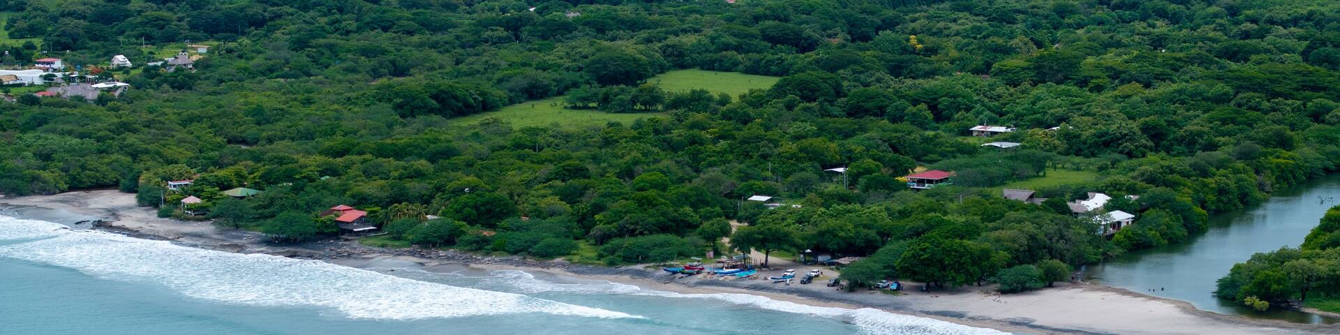 Aerial view of Surfers lined up in Popoyo, Nicaragua