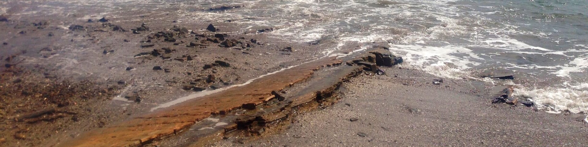 Magnific Rock! Don't forget to swim out and visit the crabs out there! So "magnificent!"