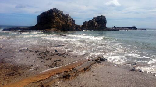 Magnific Rock! Don't forget to swim out and visit the crabs out there! So "magnificent!"