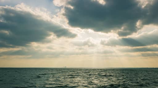 Sunstreaks through clouds over Lake Ray Hubbard in Texas.
