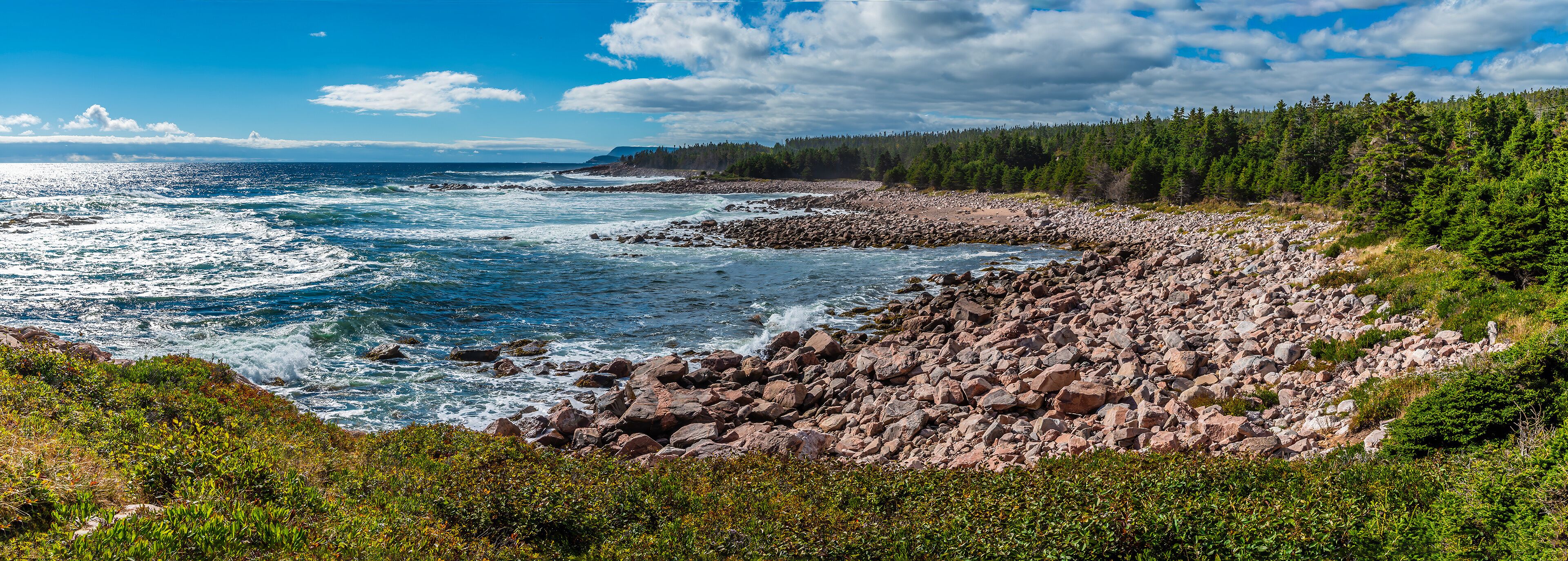 A panorama view over rocky bays at Green cove, Ingonish on the Cabot Trail, Nova Scotia, Canada in the fall