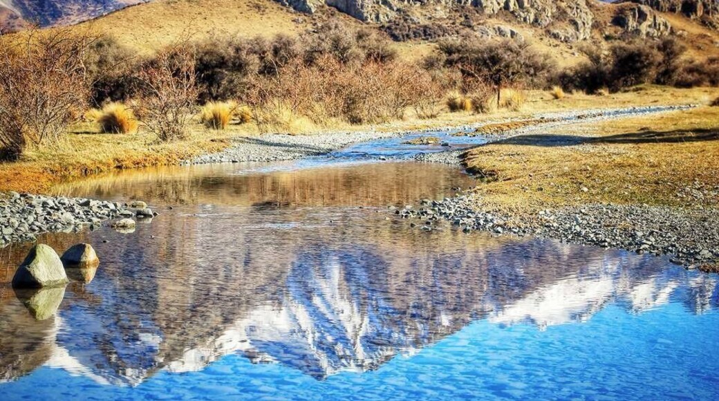 Mt. Sunday which you might recognize as Edoras in the Lord of the Rings - took them 11 months to build the set here, absolutely epic place! It's a 2.5 hr drive from Christchurch down gravel roads, usually ok in a regular 2WD car with an 1.5 hour return hike to the summit. Absolutely stunning, best visited in winter when there's snow on the mountains. It's a couple minutes past Mt. Potts Station where you can dine or sleep, no phone service anywhere near here