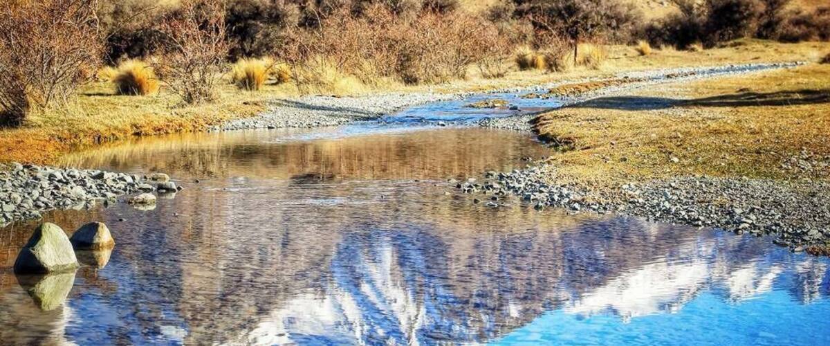 Mt. Sunday which you might recognize as Edoras in the Lord of the Rings - took them 11 months to build the set here, absolutely epic place! It's a 2.5 hr drive from Christchurch down gravel roads, usually ok in a regular 2WD car with an 1.5 hour return hike to the summit. Absolutely stunning, best visited in winter when there's snow on the mountains. It's a couple minutes past Mt. Potts Station where you can dine or sleep, no phone service anywhere near here