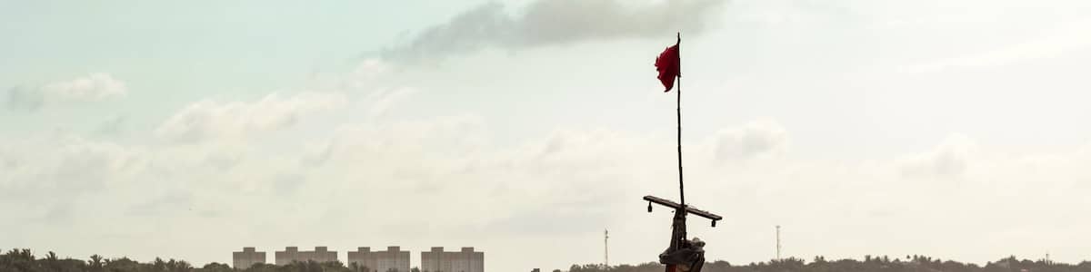 A rustic, traditional artisanal fishing boat in the state of Maranhão, Brazil, with the background blurred.