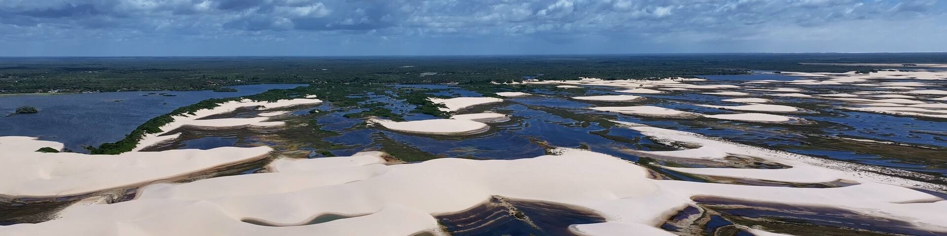 Small Sheets At Paulino Neves In Maranhao Brazil. Nature Landscape. Winding Sand Dunes. Small Sheets At Paulino Neves. Rainwater Lakes. Beautiful High Dunes. Summer Travel. Brazil Northeast.