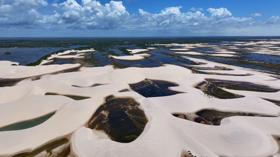 Small Sheets At Paulino Neves In Maranhao Brazil. Nature Landscape. Winding Sand Dunes. Small Sheets At Paulino Neves. Rainwater Lakes. Beautiful High Dunes. Summer Travel. Brazil Northeast.