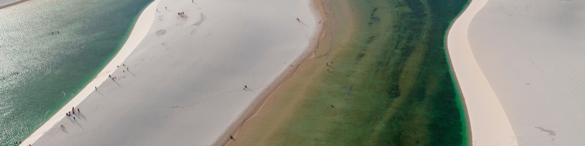 Aerial view of Lencois Maranhenses. White sand dunes with pools of fresh and transparent water. Desert. Barreirinhas. Maranhao State National Park. Brazil