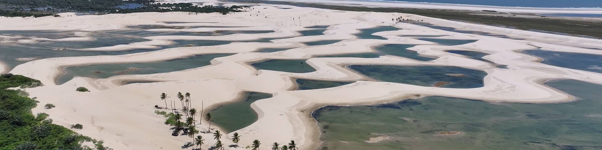 Small Sheets At Tutoia In Maranhao Brazil. Freshwater Lakes Landscape. Sand Dunes Mountains. Small Sheets At Tutoia. Tourism Travel. Nature Scene. Beach Background. Brazil Northeast.