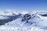 Ski slopes on a hill with snowy, mountain peaks in the background, La Plagne, Alps, France, Shutterstock ID 529943059, Purchase Order: -