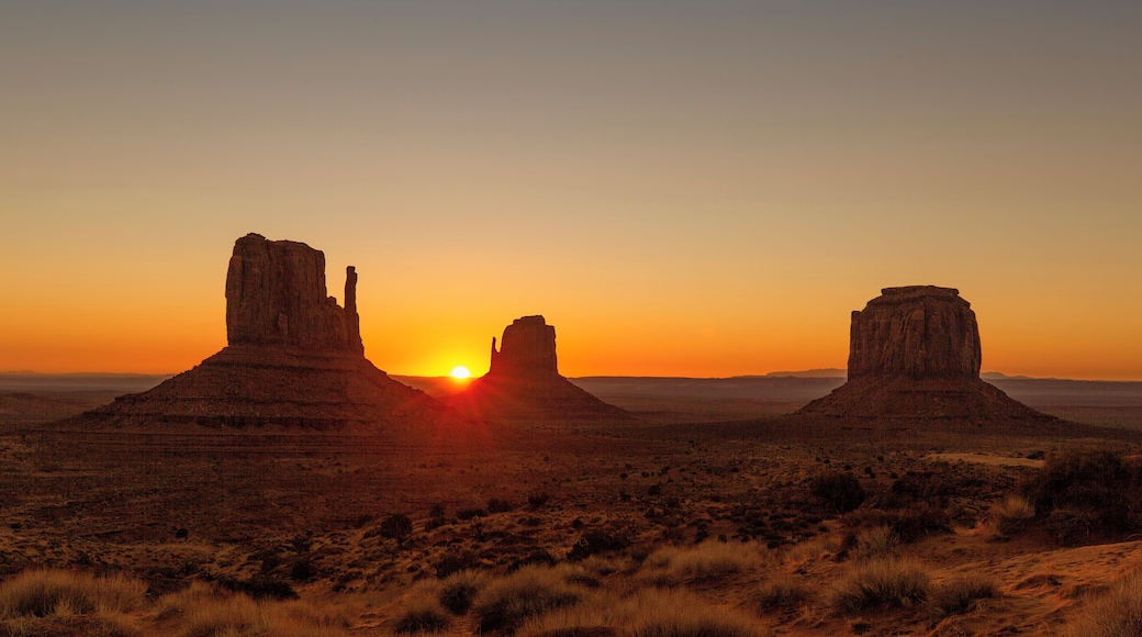 There is a campground inside Monument Valley. The Campground and the hotel are the only two places you can legally watch the sunrise come up over Monument Valley. The valley road is closed to non-residents during the night.
If you go to campground it is first come first serve, starting at noon. I would recommend going early and grabbing one of the prime spots. You will have an amazing view from your tent of the mittens coming up. This was mine.
