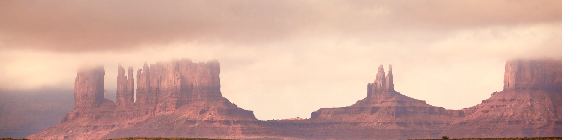 Monument Valley showing a gorge or canyon, landscape views and tranquil scenes