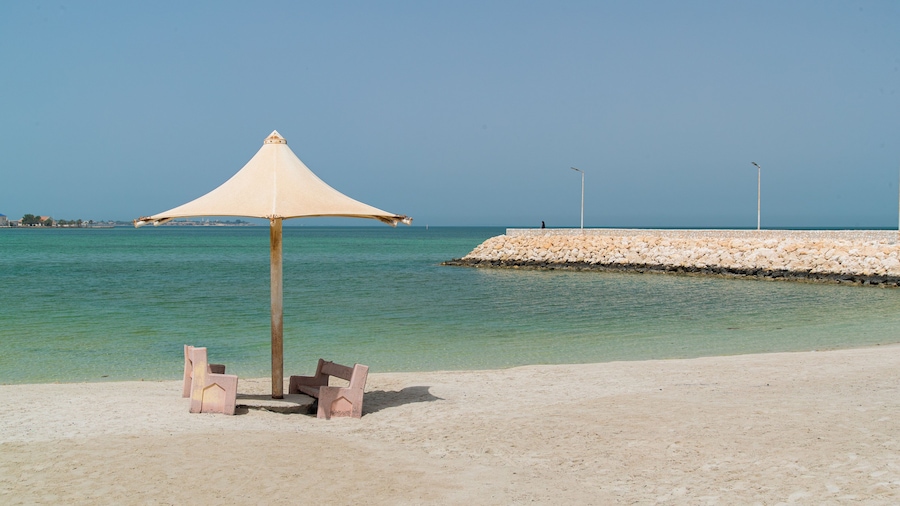 Budaiya showing a beach and general coastal views