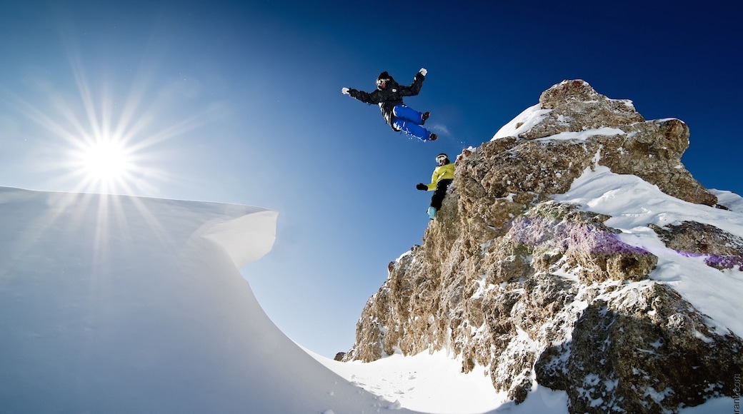 Val-d\'Isere which includes snow as well as a small group of people