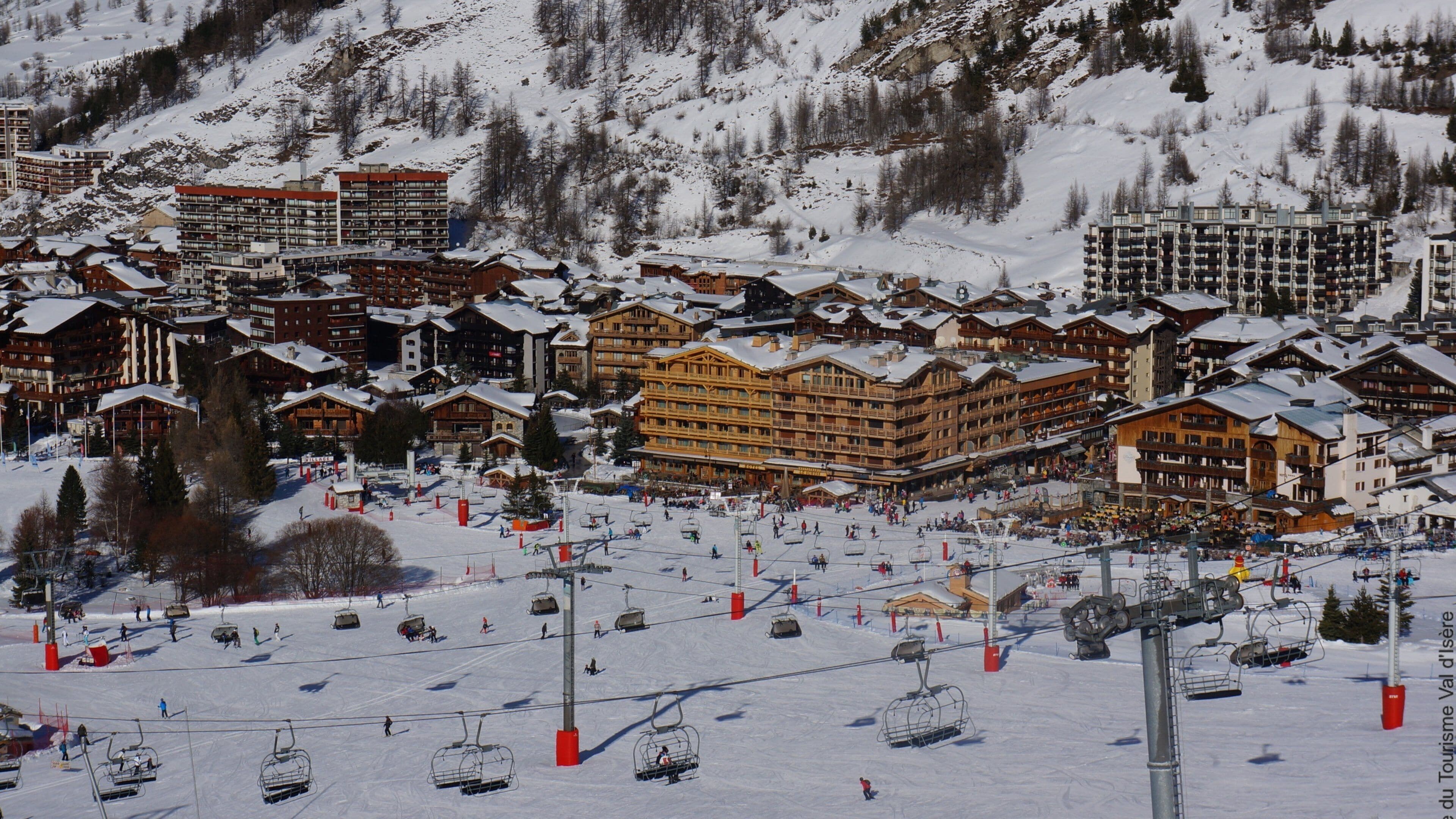 Val-d\'Isere Ski Resort featuring a small town or village, snow and a gondola