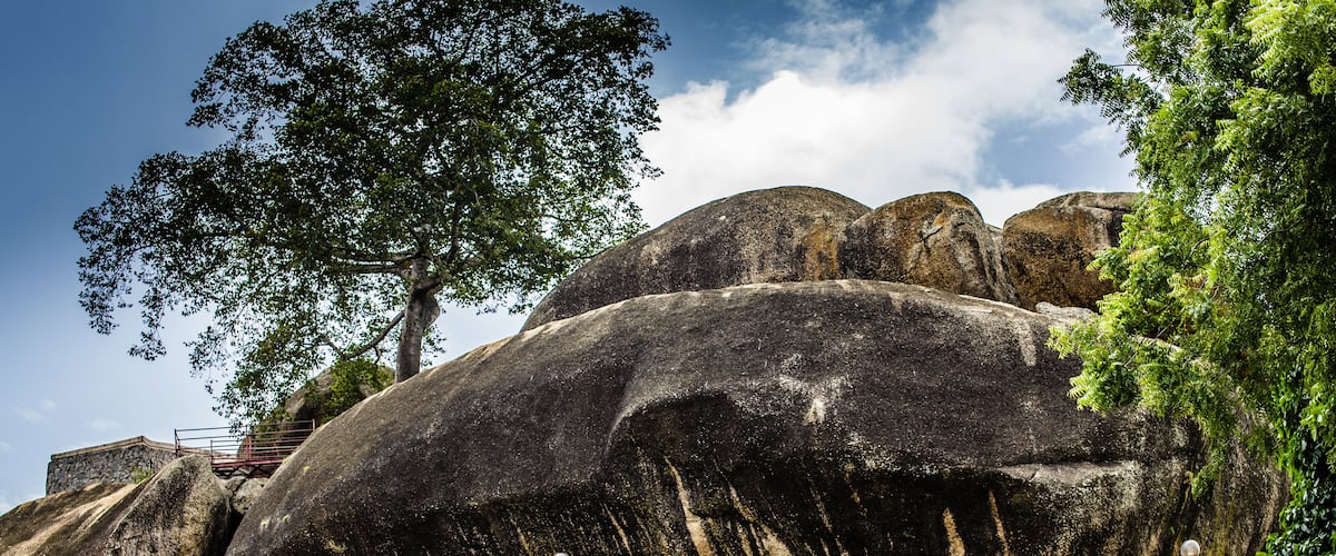 Large boulders with a staircase leading up to a platform.