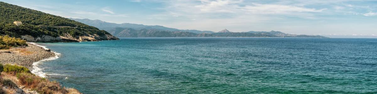 Coastline and pebble beach at Farinole in Corsica