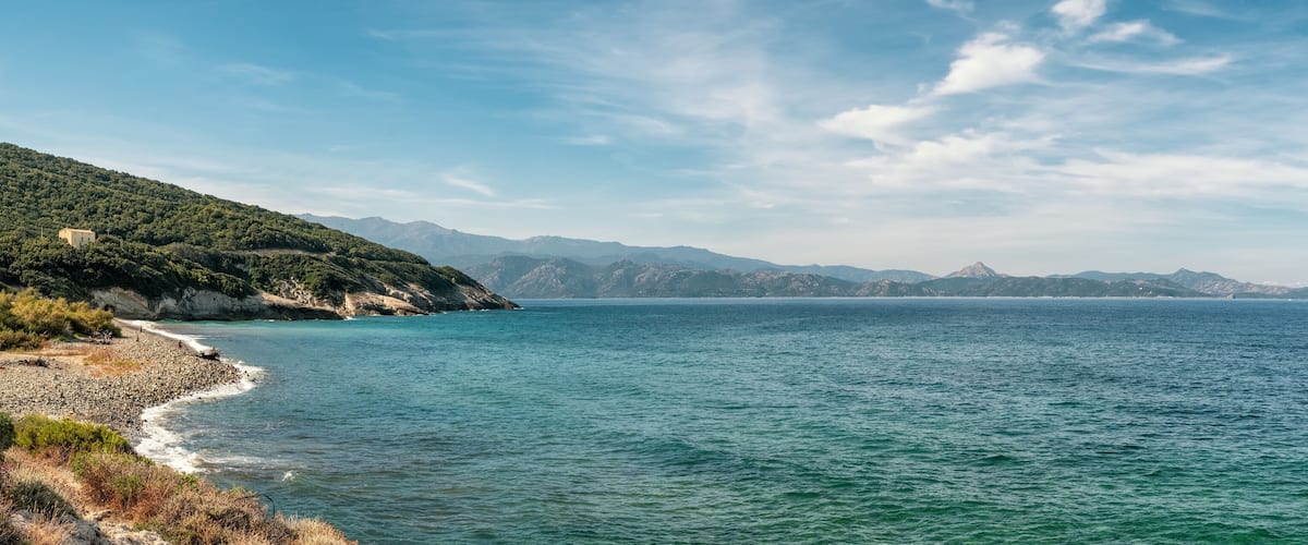 Coastline and pebble beach at Farinole in Corsica