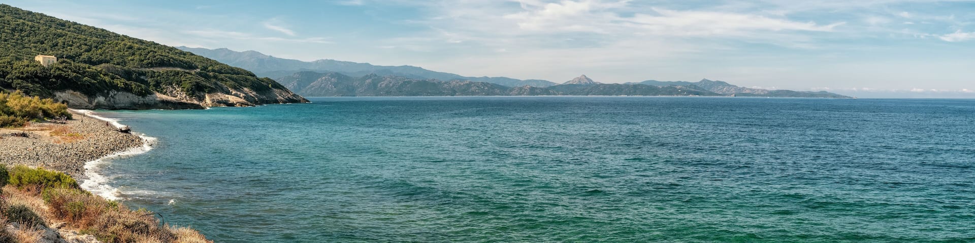 Coastline and pebble beach at Farinole in Corsica