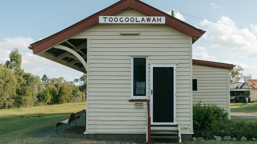 Toogoolawah which includes signage and a small town or village