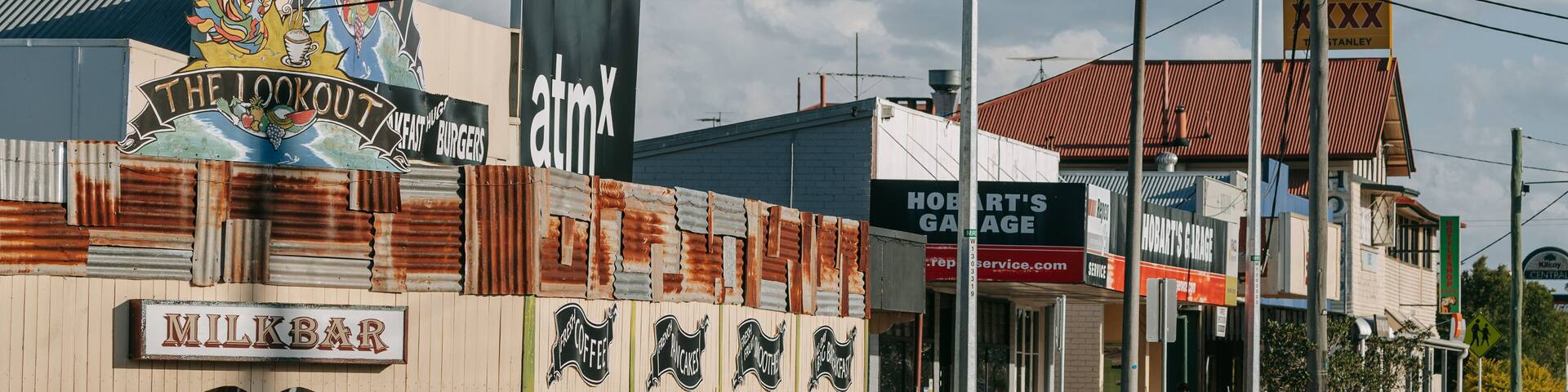 Kilcoy featuring a small town or village and signage