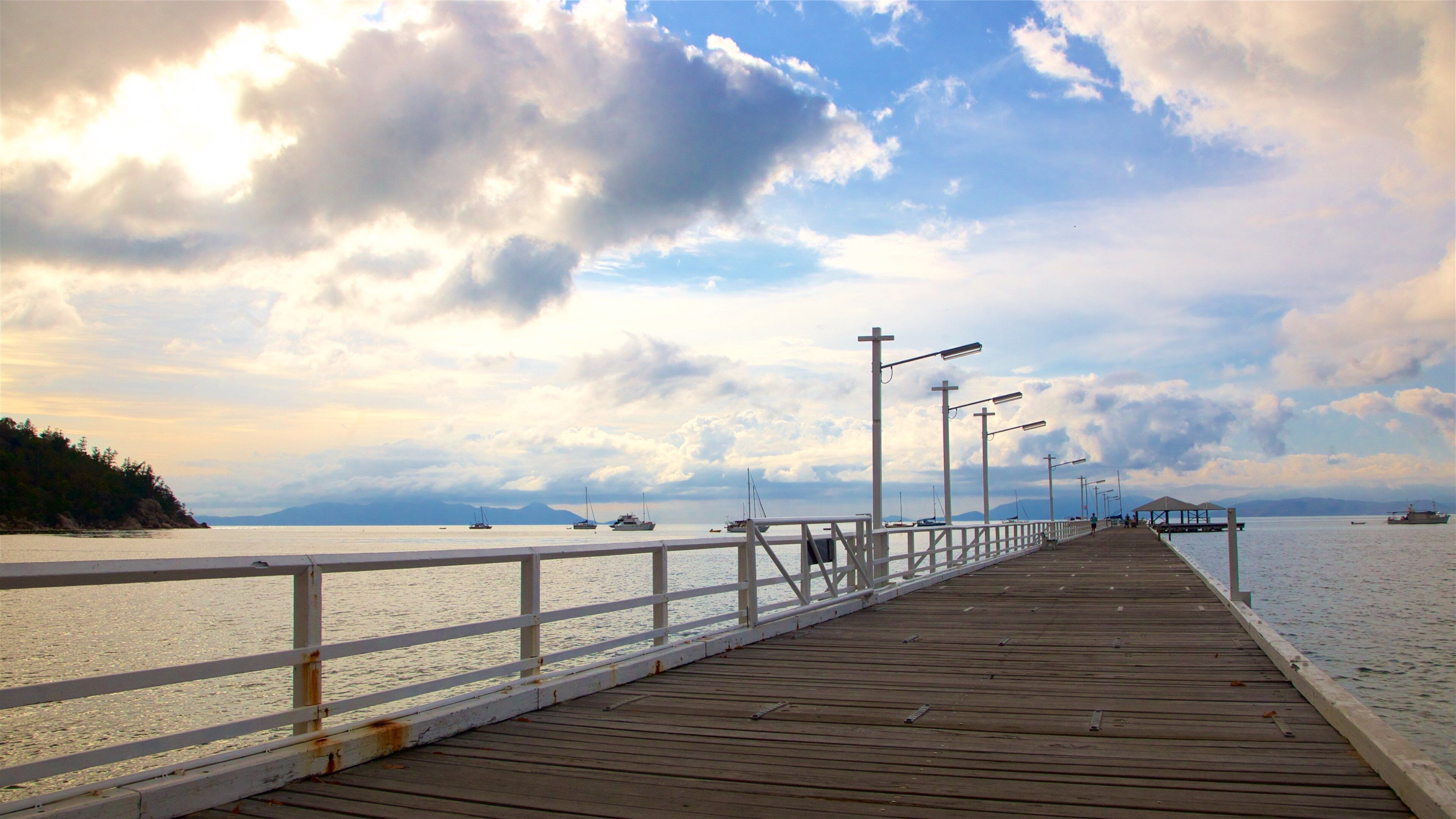 Picnic Bay featuring general coastal views and a sunset