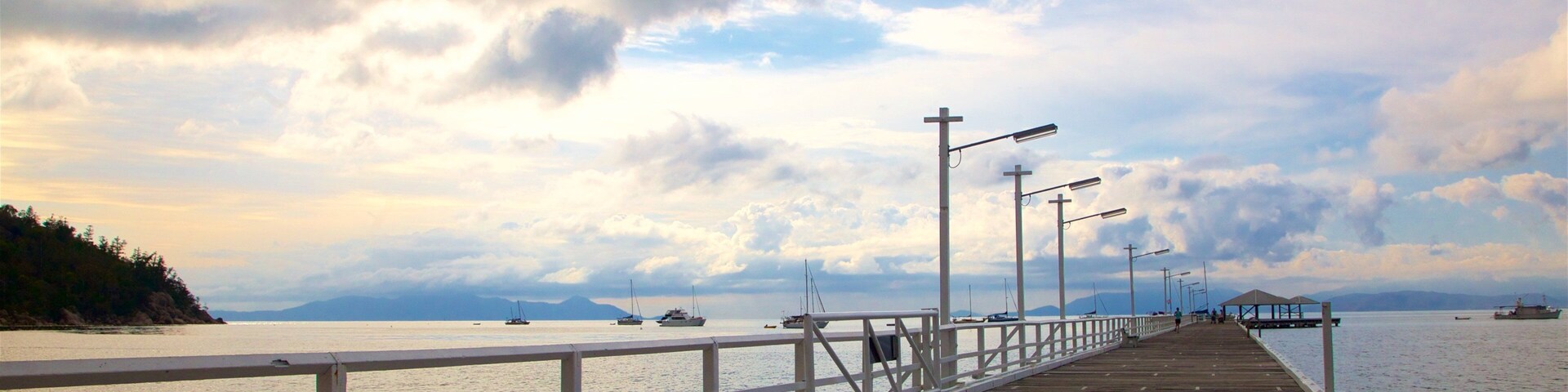 Picnic Bay featuring general coastal views and a sunset