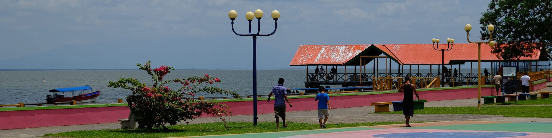 A colorful playground with a view of the sea.