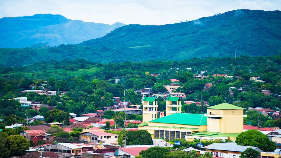Panoramic view of the city center of Juigalpa, Chontales. Beautiful town full of trees, between mountains. View of the Cathedral "Nuestra Señora de la Asunción". Visit Nicaragua. Community Tourism.