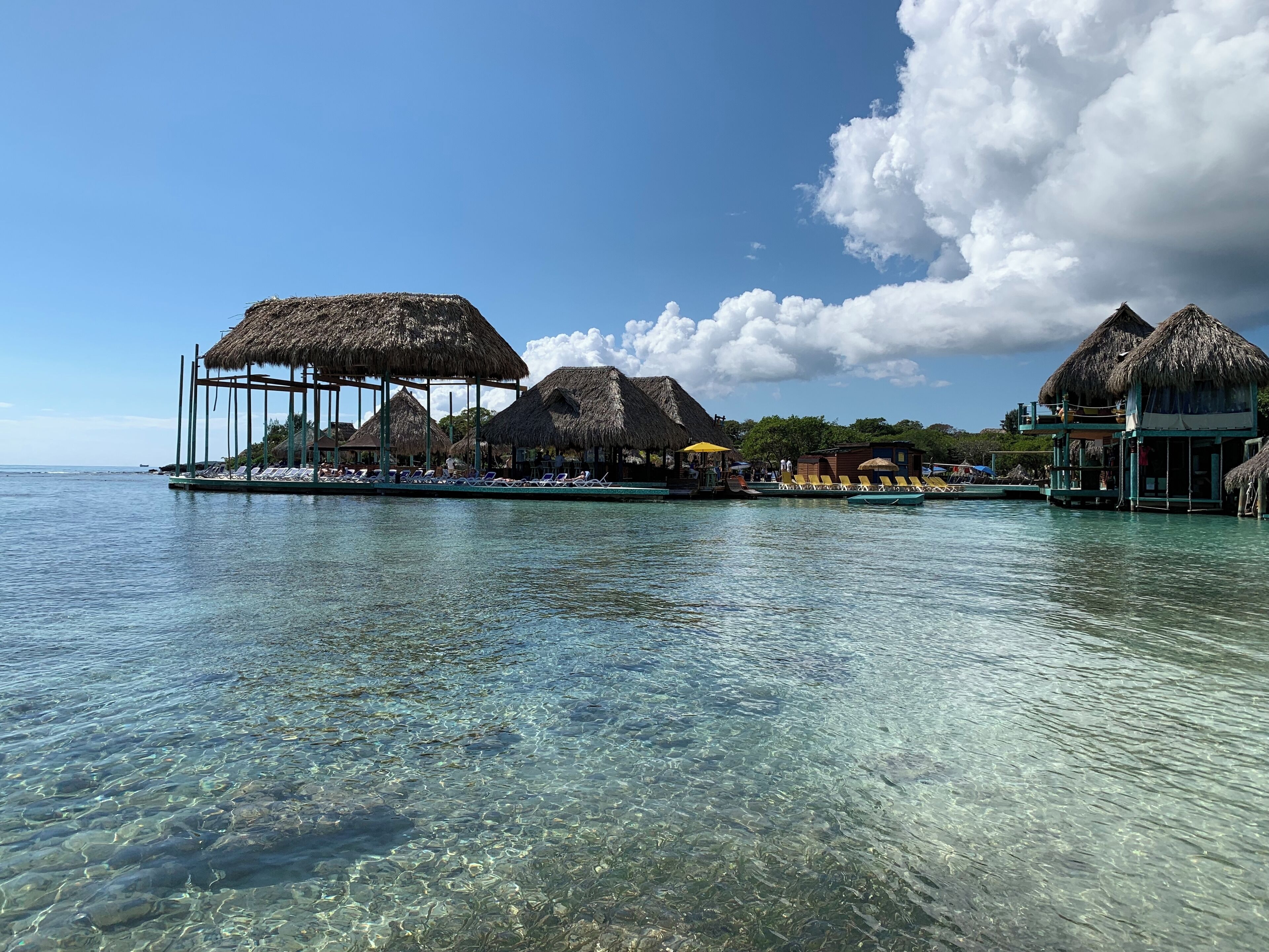 #Roatan #Honduras #LittleFrenchKey #beach #island

Numa parada de um cruzeiro na ilha de Roatan, em Honduras, resolvemos fazer uma excursão a Little French Key. Depois de uma breve travessia de lancha chegamos à Ilha que é um resort particular e é muito bem cuidada. Tem bares, cadeiras de praia, redes, guarda-sois e outras amenidades. Embora eu não seja muito a favor, tem até alguns animais em jaulas (leões pequenos e uma onça) e outros soltos (macacos). Pulamos de cordas na água, fizemos snorkel, praticamos Stand up Paddle e nos balançamos sobre as águas azuis e verdes do Caribe. O almoço, escolhido individualmente de um cardápio reduzido, foi-nos servido na praia.

At a cruise stop on the island of Roatan, Honduras, we decideh, chosen individually from a reduced menu, was served to us on the beach.d to take a trip to Little French Key. After a short boat ride we arrived at the island which is a private resort and is very well maintained. It has bars, beach chairs, hammocks, umbrellas and other amenities. Although I disagree, there is a little zoo with small lions and an ounce. Also some monkeys for pictures. We jumped from ropes into water, snorkelled, practiced Stand up Paddle and swayed over the blue and green waters of the Caribbean. The lunc