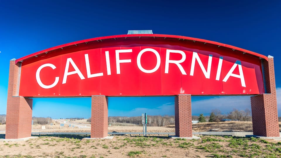 A large red arch with the word "CALIFORNIA" in white letters.
