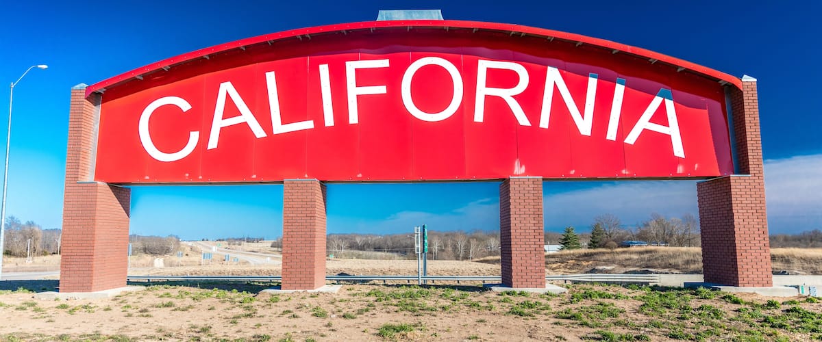 A large red arch with the word "CALIFORNIA" in white letters.