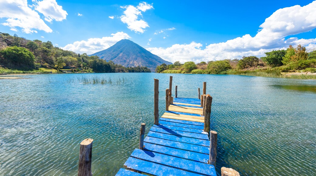Beautiful bay of Lake Atitlan with view to Volcano San Pedro in highlands of Guatemala, Central America