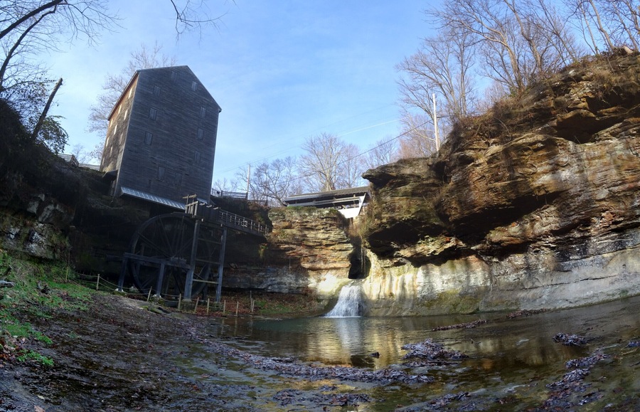 Rock Mill Park encompasses the historic Rock Mill, a stunning grist mill built in 1824 above the Hocking River Falls and the scenic Rock Mill Covered Bridge, constructed in 1901.
Standing 90 feet above the gorge of the falls, Rock Mill was one of a dozen mills in the area whose power source was the Hocking River. The mill was in operation grinding flour and corn into wheat and meal as late at 1905.