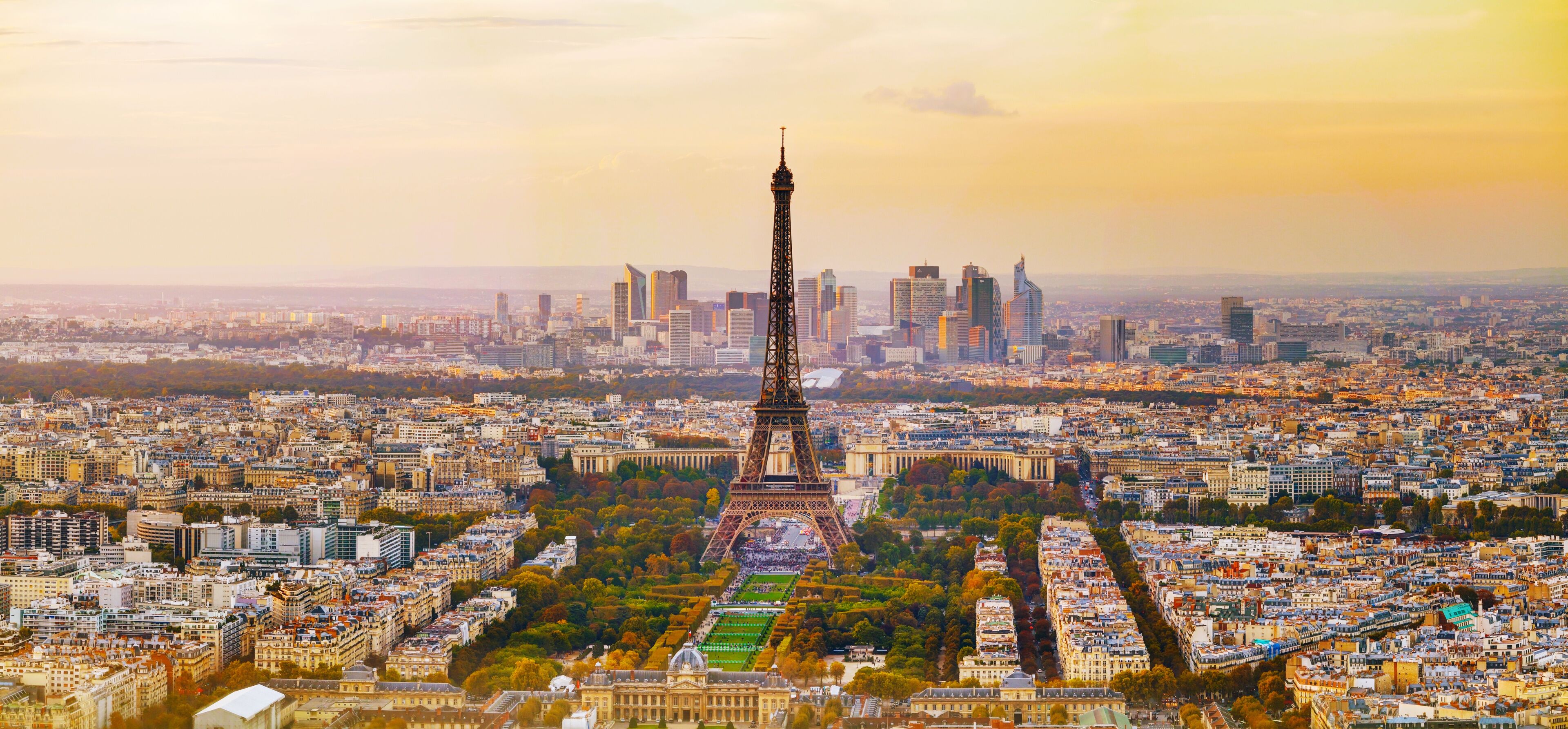 The Eiffel Tower, Paris cityscape, and the Champs-Élysées.