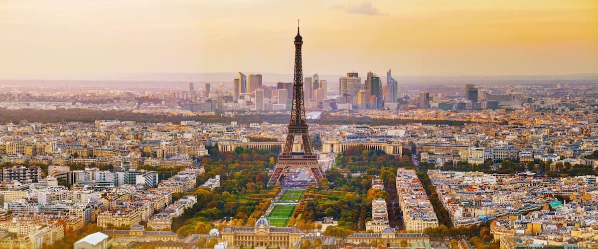 The Eiffel Tower, Paris cityscape, and the Champs-Élysées.