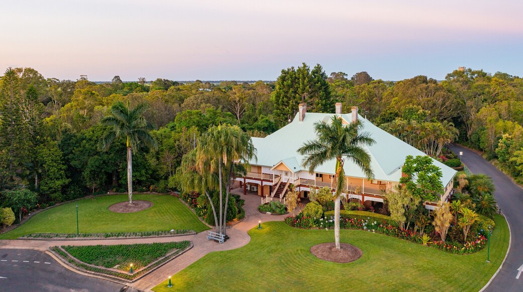 Bundaberg North showing landscape views, a house and a sunset