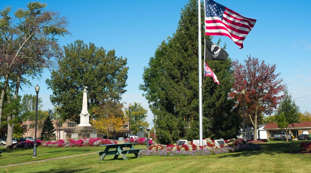A U.S. flag flies at half staff in the midst of the town square in Twinsburg, Ohio