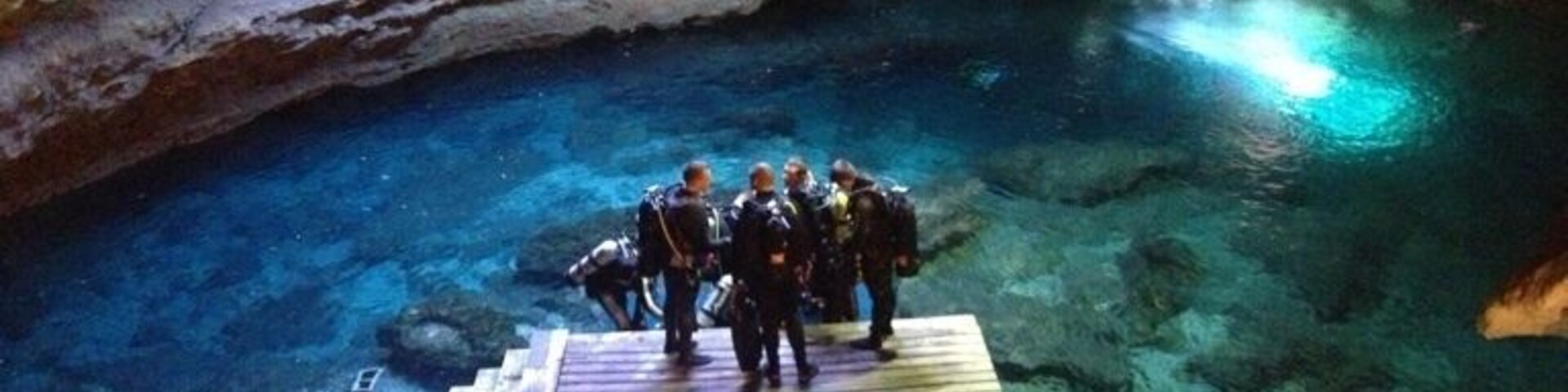 Devils den Williston fl. It's a sink hole that you can dive in. Depth is approx 60 feet deep.