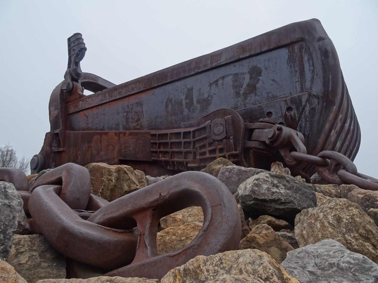 This giant bucket is all that remains of Big Muskie.

Big Muskie was a coal-mining dragline excavator, longer than a football field, weighing 12,200  tons and standing nearly 22 stories tall. It operated in southeastern Ohio from 1969 to 1991.

It was the largest machine ever to move on land. 

The 220 cubic yard bucket could hold two full size buses.