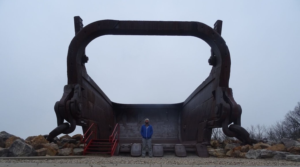 This giant bucket is all that remains of Big Muskie.
Big Muskie was a coal-mining dragline excavator, longer than a football field, weighing 12,200 tons and standing nearly 22 stories tall. It operated in southeastern Ohio from 1969 to 1991.
It was the largest machine ever to move on land.
The 220 cubic yard bucket could hold two full size buses.