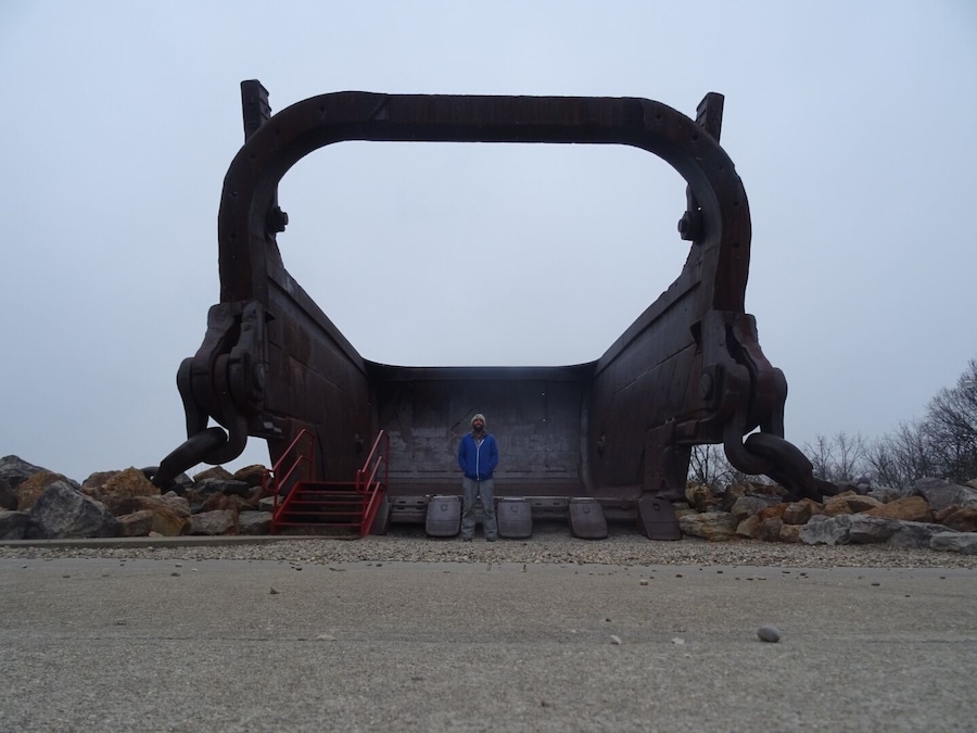 This giant bucket is all that remains of Big Muskie.
Big Muskie was a coal-mining dragline excavator, longer than a football field, weighing 12,200 tons and standing nearly 22 stories tall. It operated in southeastern Ohio from 1969 to 1991.
It was the largest machine ever to move on land.
The 220 cubic yard bucket could hold two full size buses.