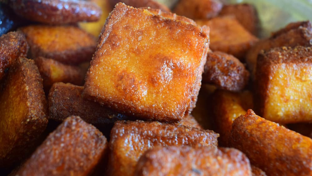 A close-up of fried dough pastries.