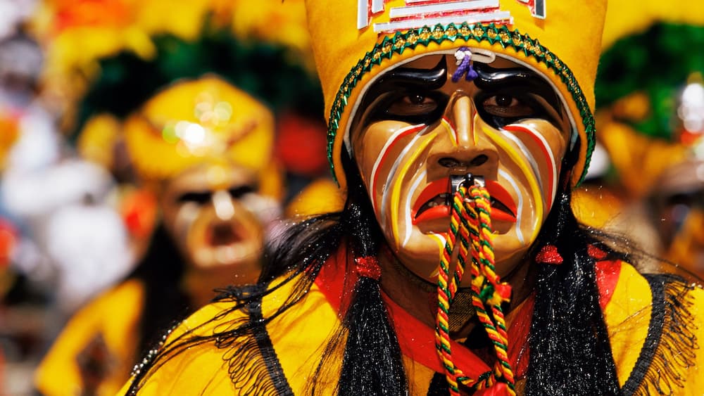Portrait of a Tobas warrior during carnival called The Devil Dance (La Diablada), Oruro, Bolivia