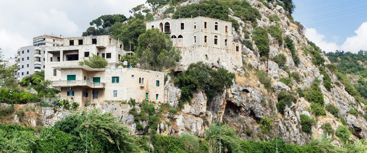 Historic bridge in Nahr el Kalb valley and Christ King statue, Zouk Mosbeh, Lebanon