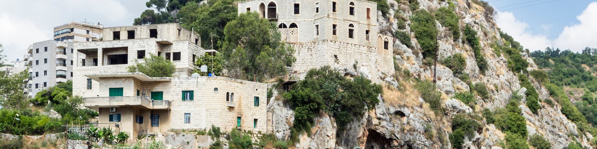 Historic bridge in Nahr el Kalb valley and Christ King statue, Zouk Mosbeh, Lebanon